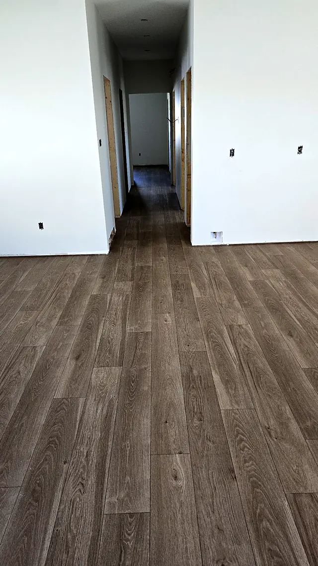 Long hallway with new plank flooring